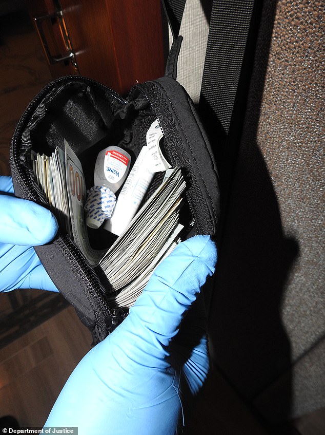 98541579-14728439-Other_images_showed_stacks_of_cash_in_the_disgraced_rap_mogul_s_-a-5_1747689189424